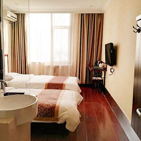 Beijing Gongmei Blue Peacock Business Hotel Buitenkant foto